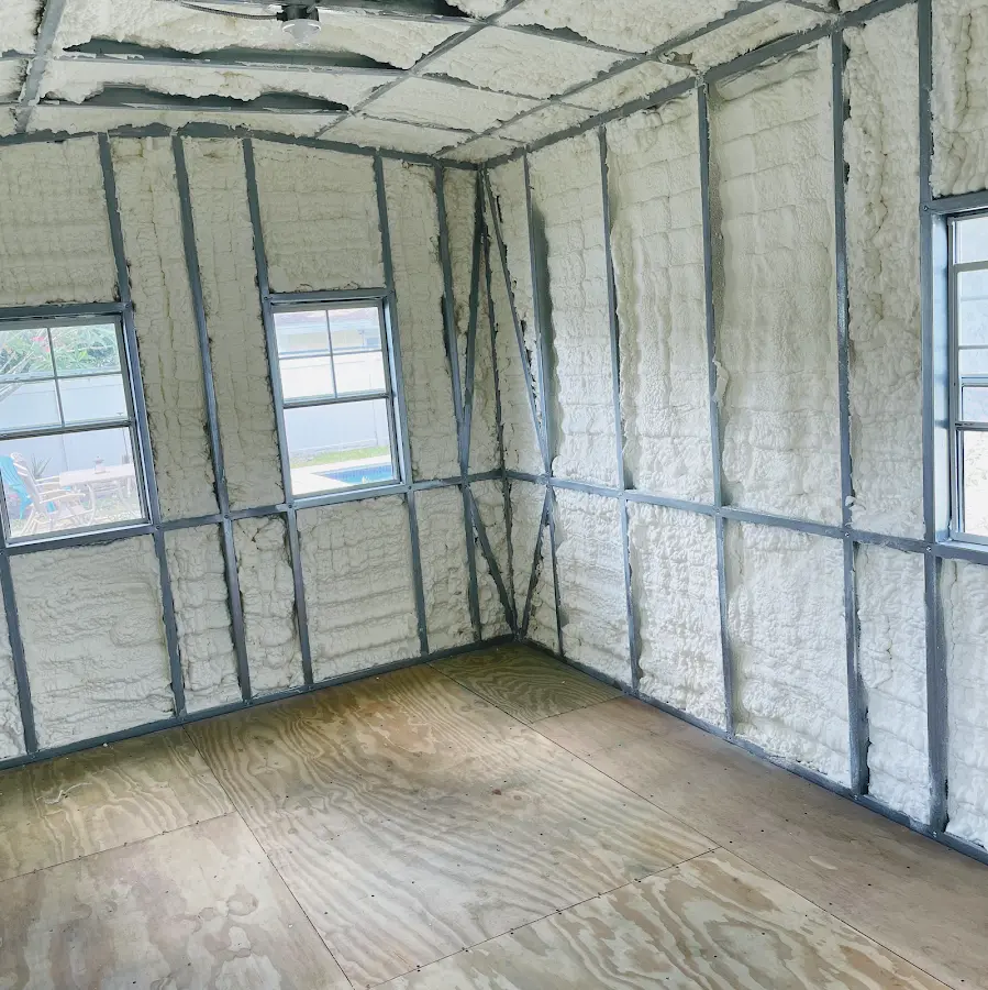 Closed-cell spray foam insulation applied to wall cavities in a residential project in North Kansas City